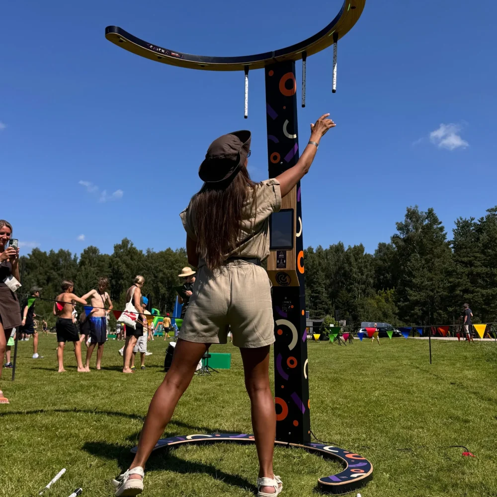 A girl playing Node CATCH game